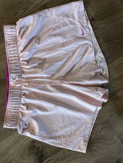 Nike pink women’s athletic shorts