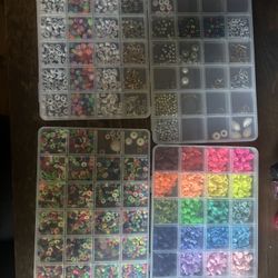 4 Boxes Of Bracelet Beads