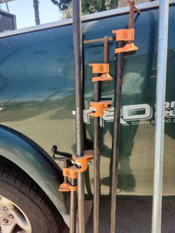 Various length 3/4 and 1/2 inch pipe clamps