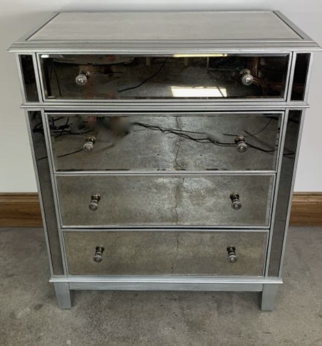Pier One Imports mirrored four drawer dresser with silver pulls