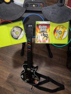 Guitar hero guitar and drum set