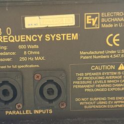 2-Electro-Voice SB180 subwoofers. Power Handling: 600 Watts, Impedance: 8 Ohms, Crossover: 250 Hz.