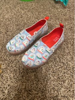 Tom’s size 13.5 youth