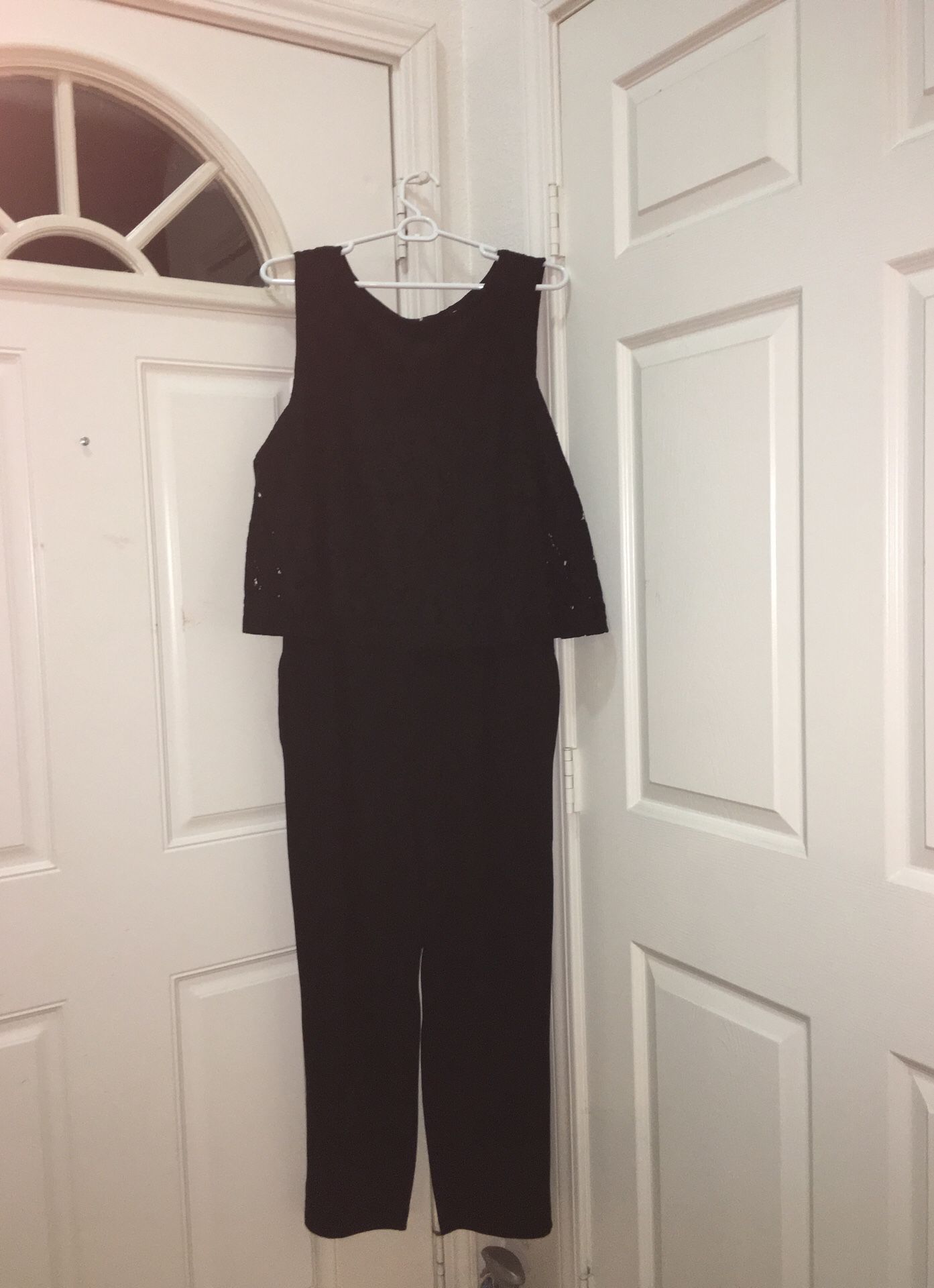 New Without Tags. UNIQLO Black classy Romper with soft Lace back and front .