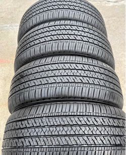 235/50/20 Brisgtone Tires con 80% de vida las 4