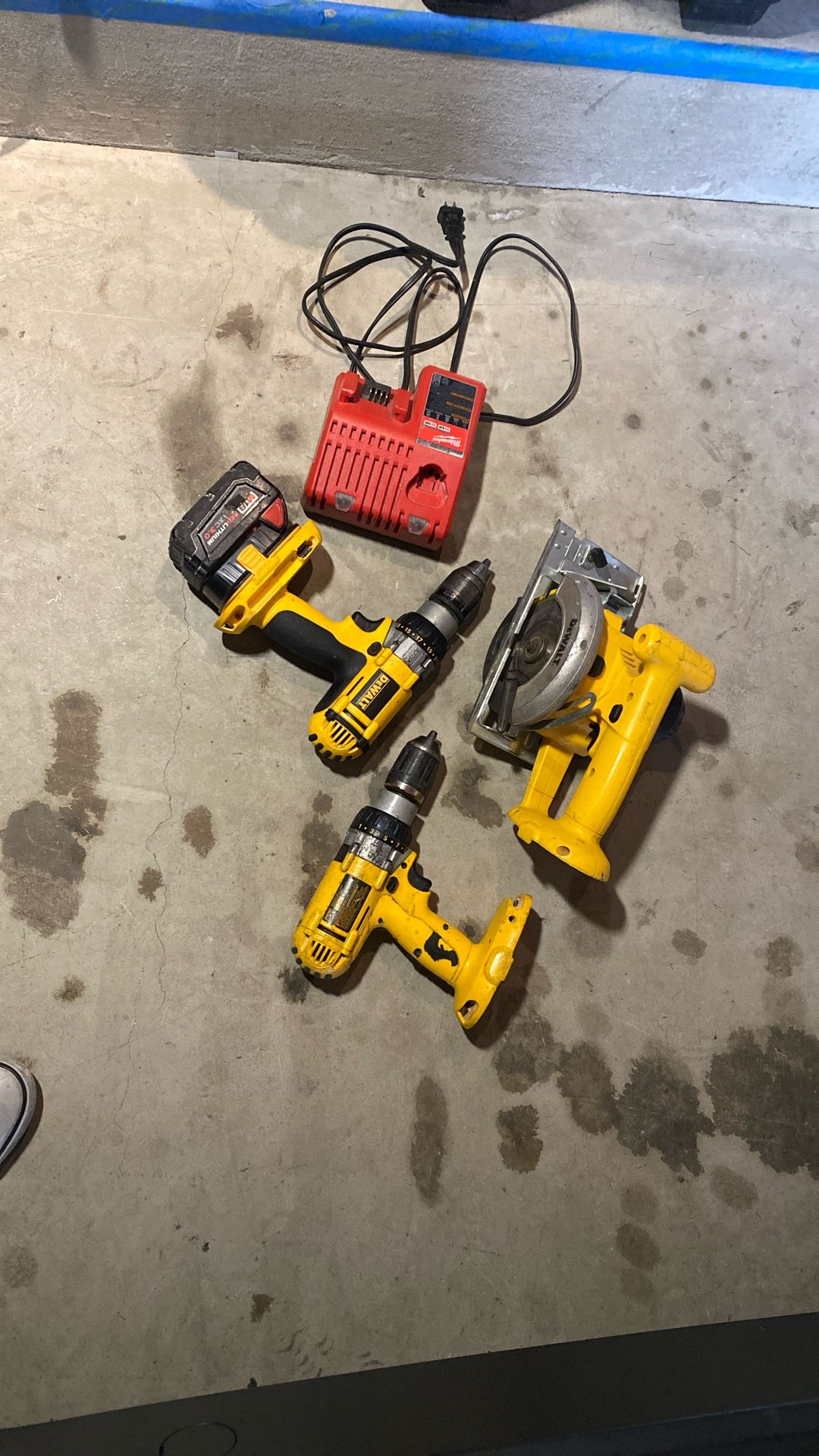 DeWalt Saw And Two Drills With A Milwaukee Battery And Charger And Also You Can Use 20 amp DeWalt Batteries
