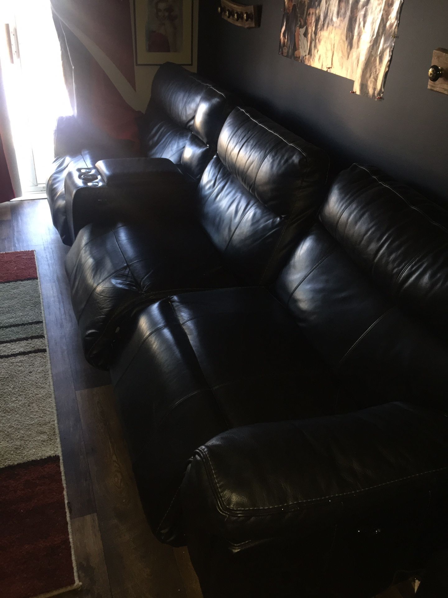 Black leather movie recliner chairs. With built in Bluetooth.