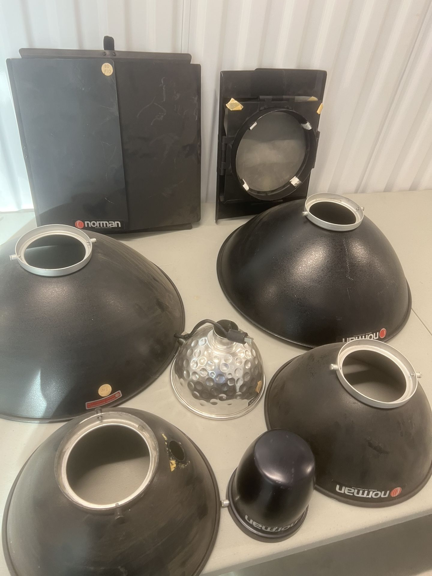 Bundle Norman Enterprises Accesories & 2-16 In Two 2 10 In Reflectors. Used in good condition with some minor cosmetic blemishes such as light scratc