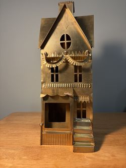 Brass metal whimsical holiday decor. Supports a candle or mini lights. Unique boutique find.