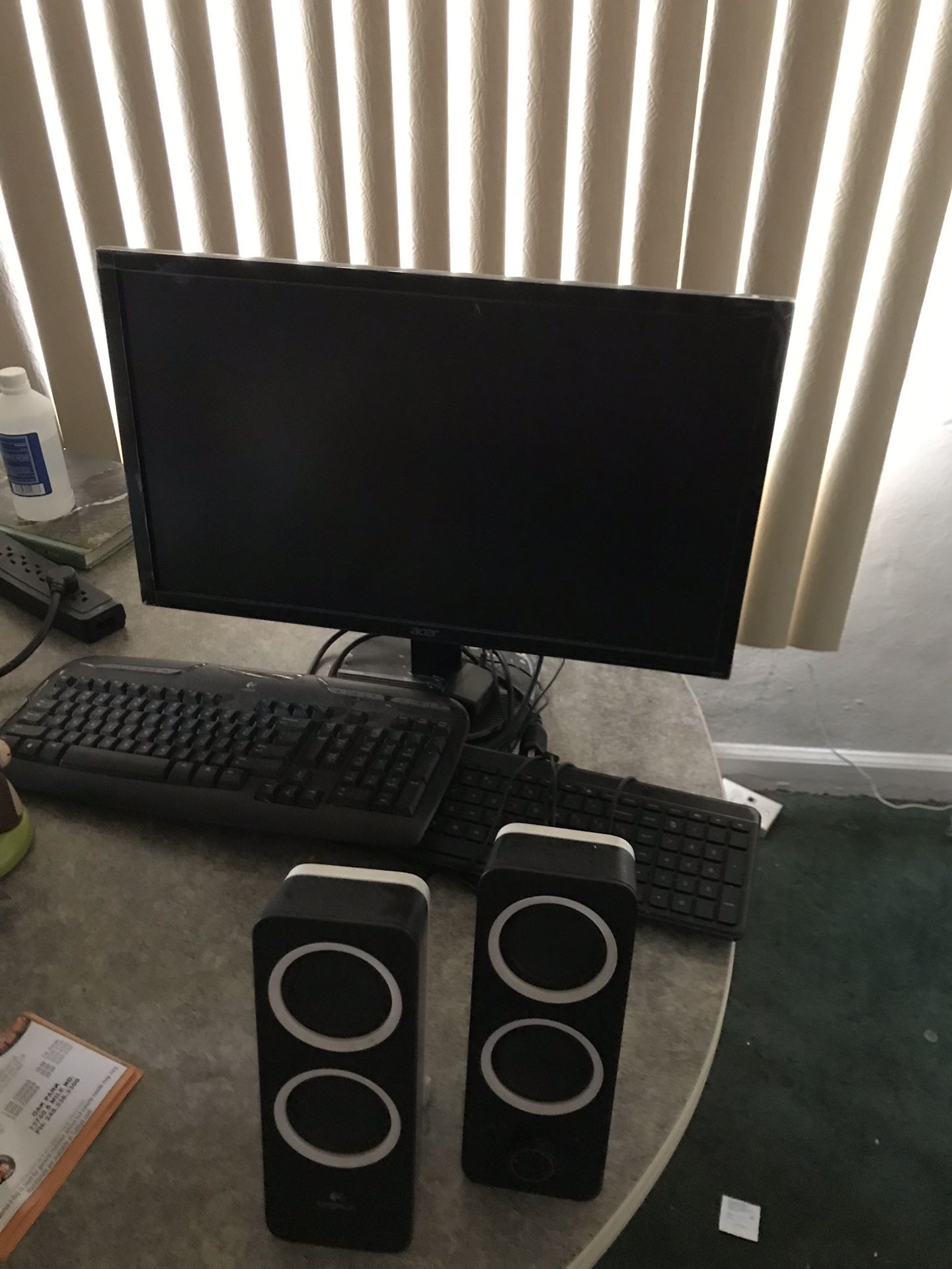 Computer monitor 24” and 2 keyboard w/ 2 speakers