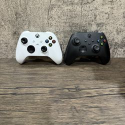 Lot of 2 Wireless Xbox Controllers White & Black 