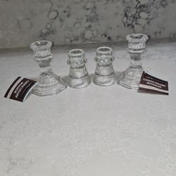 GLASS CANDLE HOLDERS 4 OF THEM