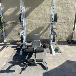Squat Rack + Bench + Barbells + Complete Weight Set