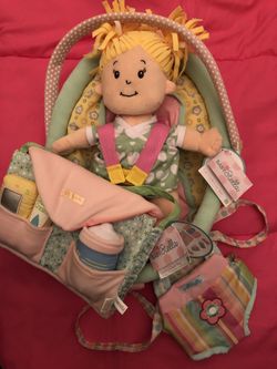 Baby Stella blonde soft baby doll,snuggle up front carrier,comfort car seat and darling baby doll diaper bag