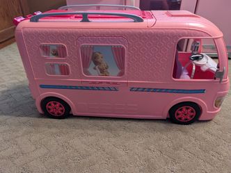 Barbie dream camper bundle. I'm including two Barbie dolls, an extra third doll, an extra animals, dolls and extra accessories for the Barbies includi