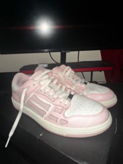 Amiri Skel Top Lows in the Pink/White colorway