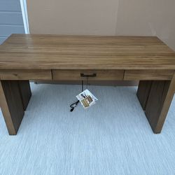 Very nice Zealand 60” Writing Desk. New but was damaged a bit in the delivery. See pics.