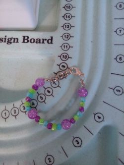 Homemade beaded bracelets and earrings