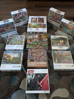 Lot of 1000-Piece Jigsaw Puzzles – 12 Puzzles
