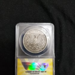 One Morgan Dollar 1882-CC Silver