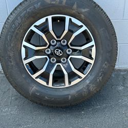 Four car wheels & Tires - Toyota Tacoma
