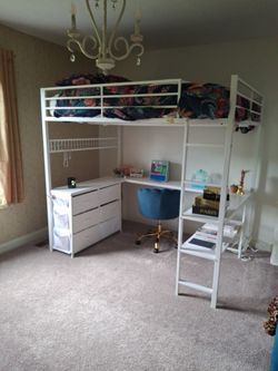 Child's lift bed with desk