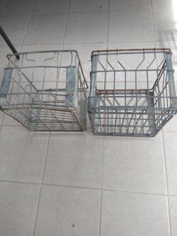 2 Vintage Hawthorn-Mellody metal milk crates used in Warrenville
