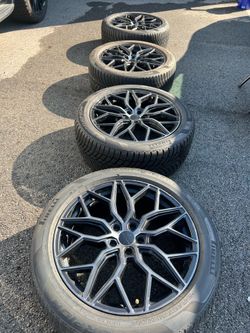 20-inch LIQUID METAL HAWK Wheels with PIRELLI SCORPION WEATHERACTIVE Tires
