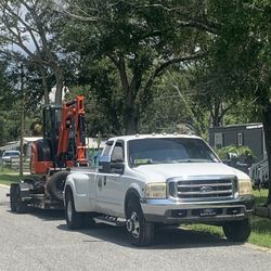 Skidsteer Excavator Land clearing & Demolition 