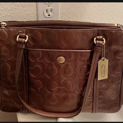 bronze colored wallet COACH excellent condition  
