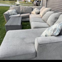 Ashley Furniture, Five Piece Sectional Wicker Coffee Table 8 X 10 Black White And Gray Rug And A Shark Robot Offer For 350 But I Need It Picked Up Sat