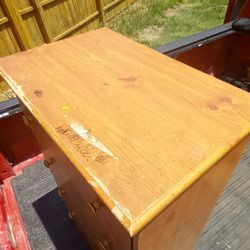 Mid size brown natural finished dresser