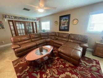 SOFA/ COUCH - BROWN LEATHER SECTIONAL FULLY ADJUSTABLE - Table included