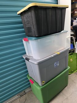 4 Big Boxes With Lids,  Gray And Green Have Wheels 