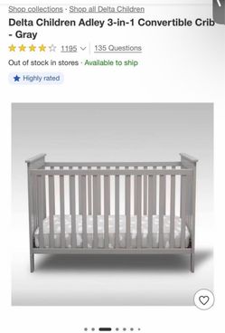 Grey baby crib