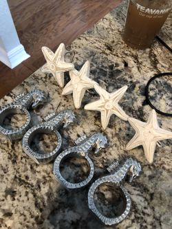 Napkin rings seahorses from pottery barn 20.00 starfish 15