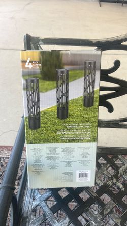 Solar pathway light with rotating light effect