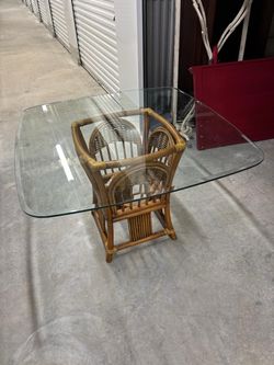 Square beveled glass table with authentic made Indonisia wicker bottom base 45 “ x 45” , 29 1/2 high $75
