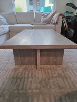 Solid wood coffee table with a beautiful whitewashed gray finish