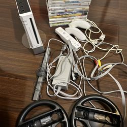 Nintendo Wii console with games and accessories