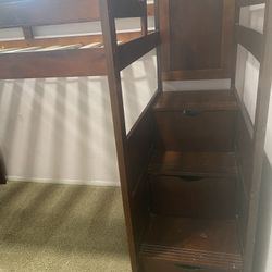 Very sturdy and heavy Darkwood twin top bunk storage in the stairs with desk and shelf already taken apart