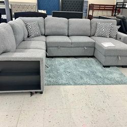 New In Boxes Grey Sectional With Pull-out Bed
