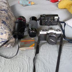 Minolta Cameras And Equipment