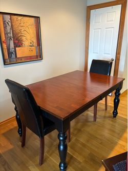 Solid wood dining room table and 4 chairs