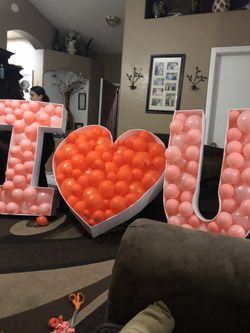 Balloon decoration Balloon Mosaics add such a nice touch to any event and picture. Prices do vary by letter, number size and font.