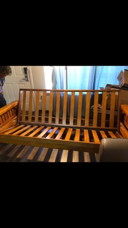 Solid wood futon /couch full size mattress.