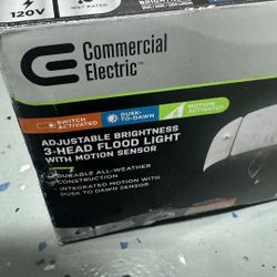 New Adjustable Brightness 3 - Head Flood Light W/ Motion Sensor Retail Value $89  + Tax 