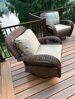Two Beacon Hill Swivel Rocker Chairs.