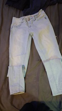 Pr of women's blye colored skinny jeans size 9