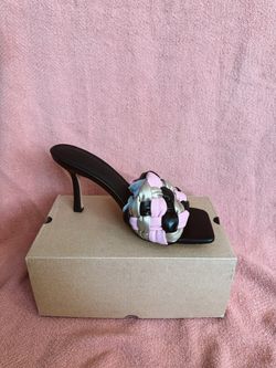 Black heel with pink and silver details